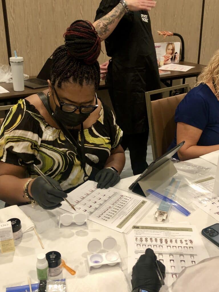 ms Pam working on new nail education content